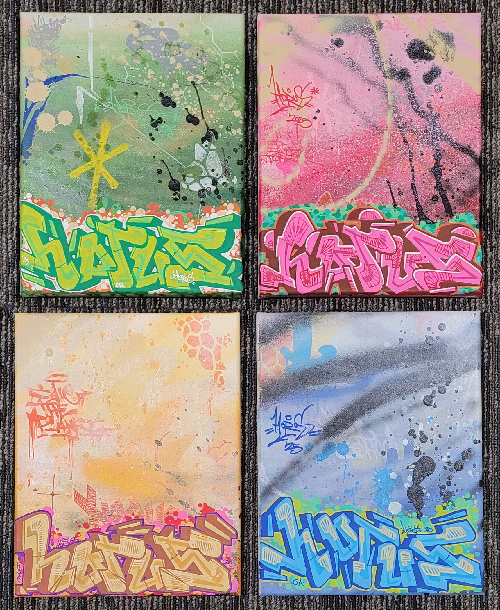 A flat lay photo displaying all four 8x10 inch graffiti art canvases from HORUS's 'The Four Flavors' collection, arranged in a 2x2 grid.